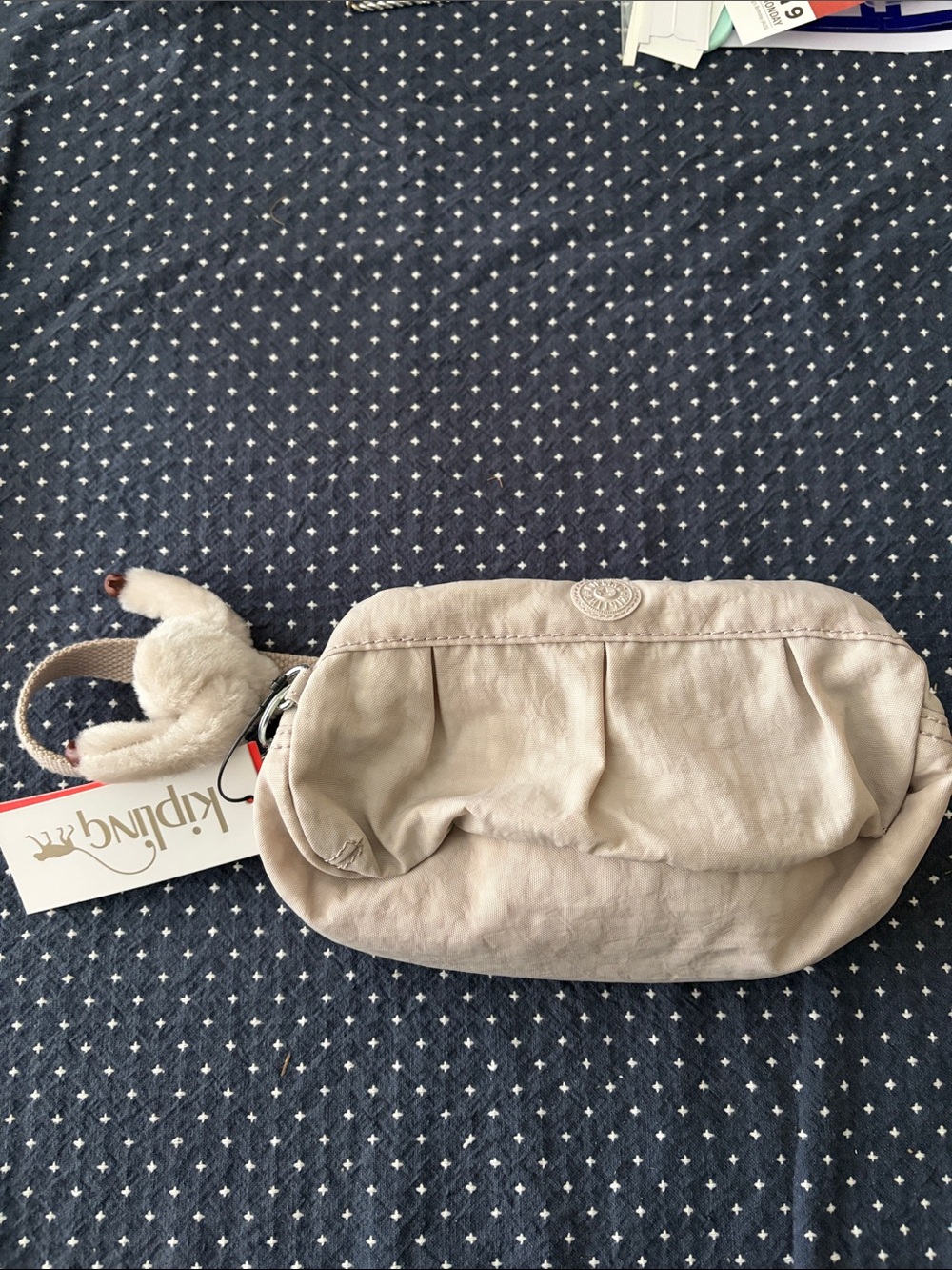 Kipling Light Beige Wristlet Clutch with Keychain Charm